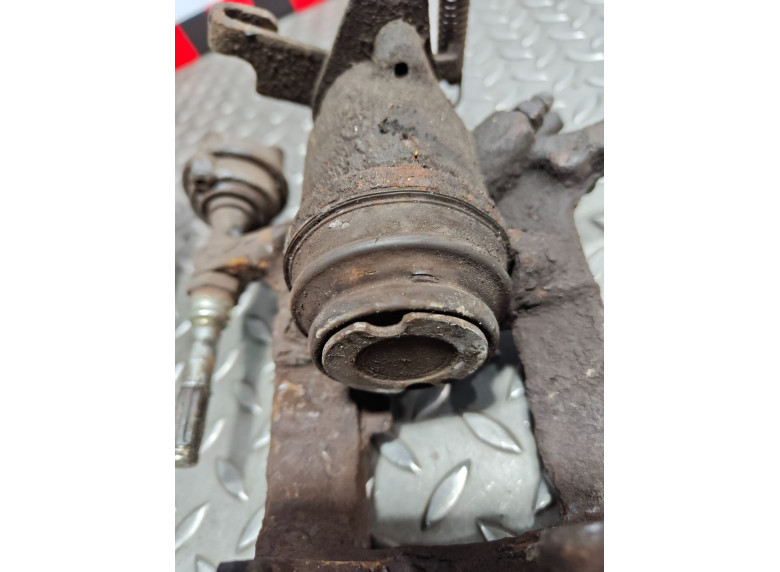 Суппорт задний левый к Opel Astra, 2010г.