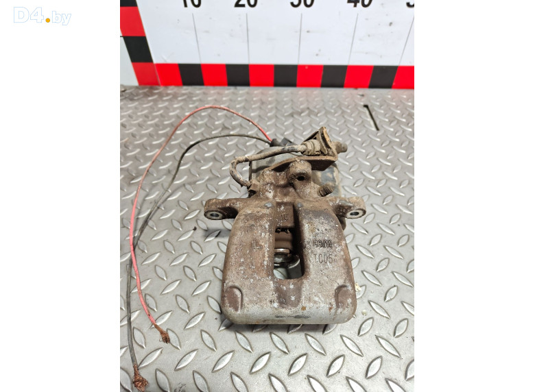 Суппорт задний левый к Volkswagen Passat 2007 г.