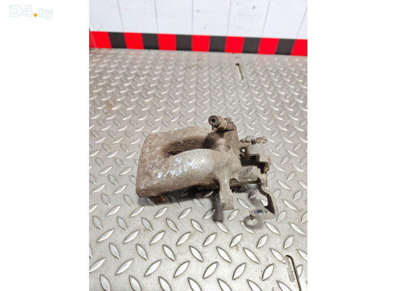 Суппорт задний левый к Opel Zafira 2008 г.