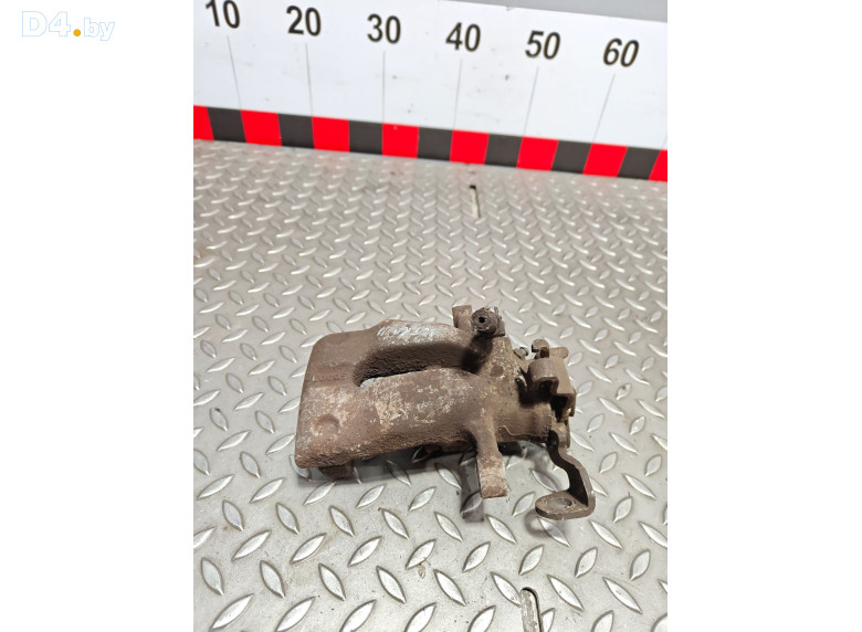 Суппорт задний левый к Opel Astra 2005 г.