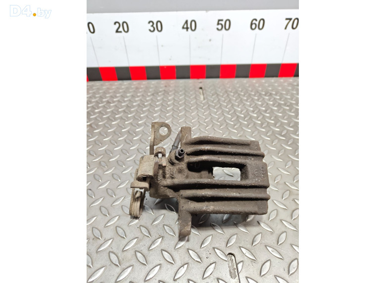 Суппорт задний правый к Volkswagen Passat 1999 г.