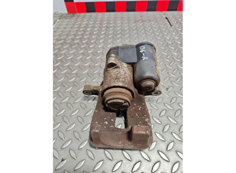 Суппорт задний правый к Volkswagen Passat, 2006г.