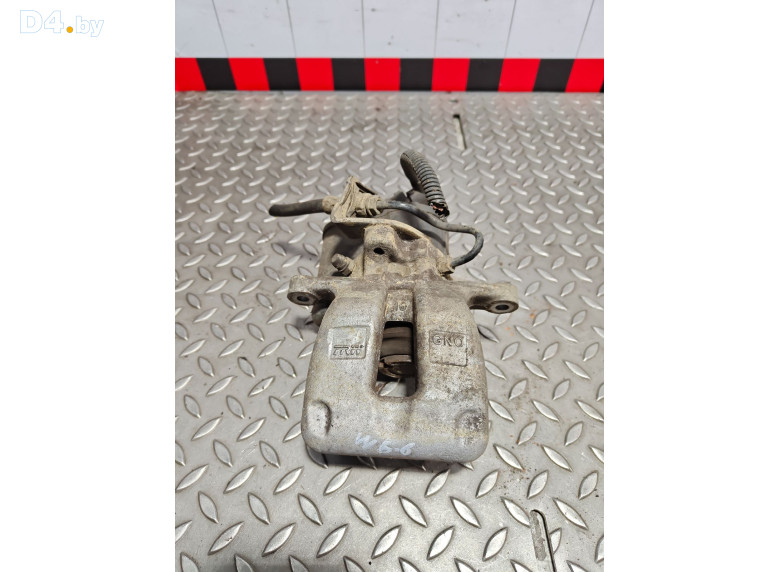 Суппорт задний правый к Volkswagen Passat 2006 г.