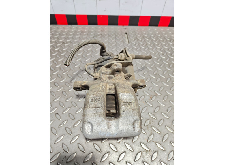 Суппорт задний левый к Volkswagen Passat, 2006г.