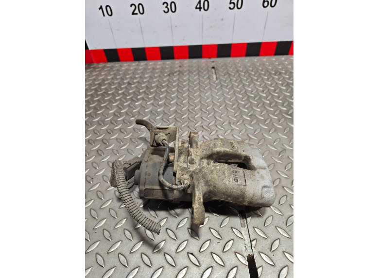 Суппорт задний левый к Volkswagen Passat, 2006г.