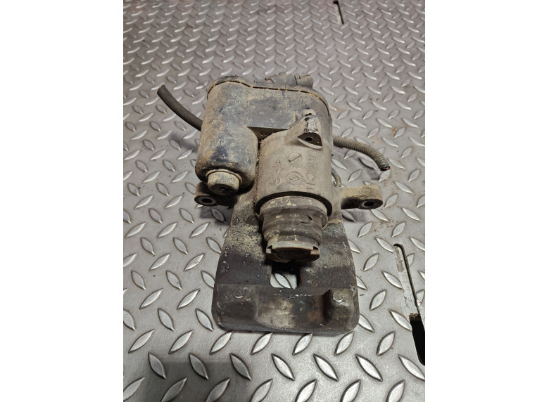 Суппорт задний левый к Volkswagen Passat, 2006г.