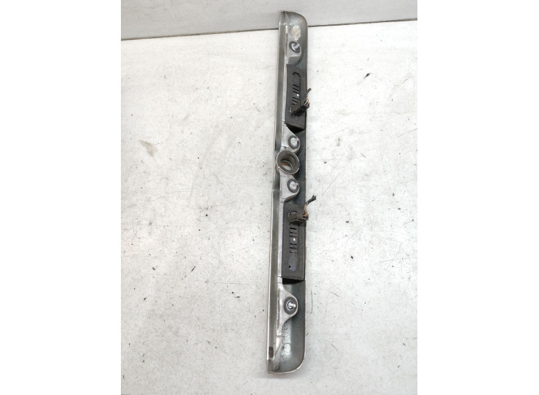 Накладка подсветки номера к Opel Astra, 2002г.