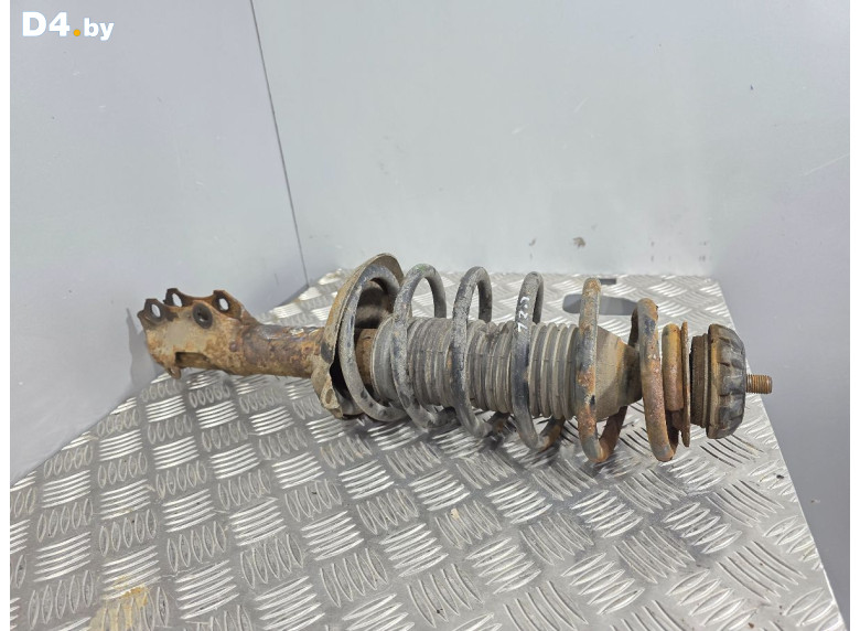 Амортизатор передний к Volkswagen Polo 1997 г.