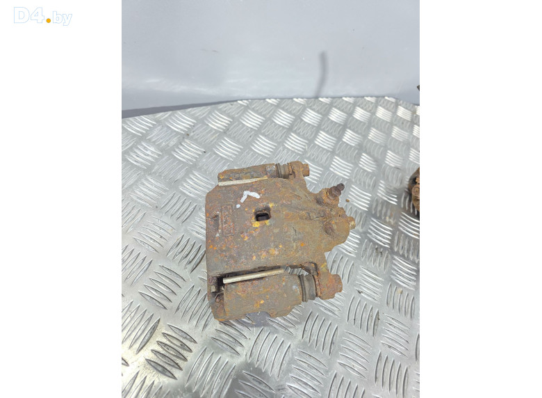 Суппорт задний левый к Mazda CX9 2007 г.