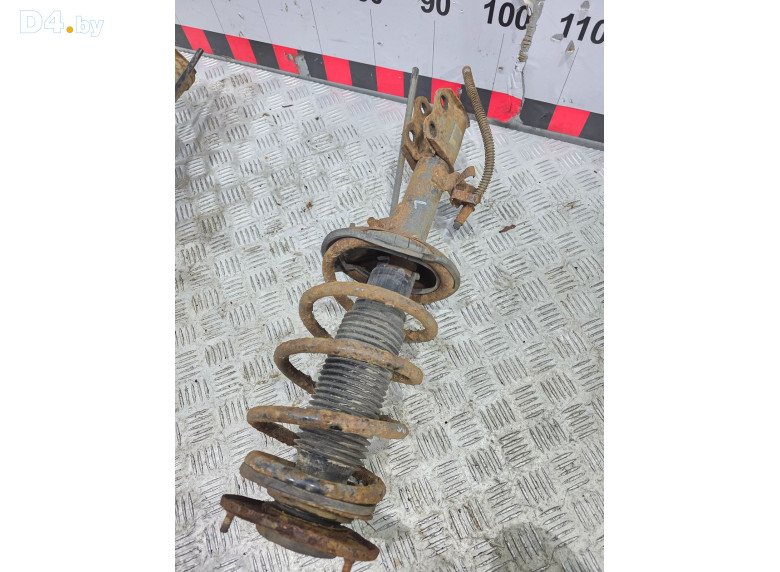 Амортизатор передний левый к Toyota Corolla 2003 г.