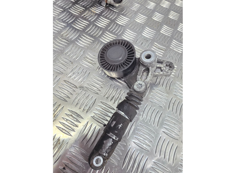 Натяжитель ремня генератора к Audi A6, 2009г.