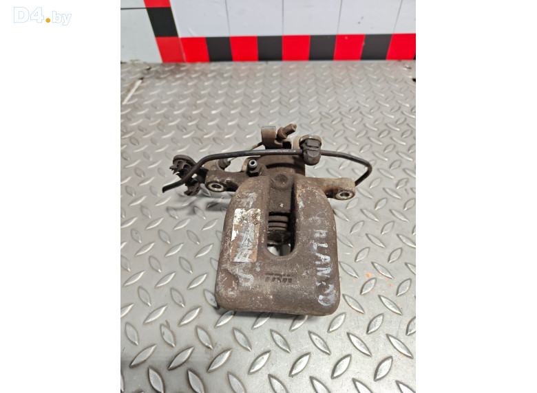 Суппорт задний левый к Peugeot Partner 2010 г.