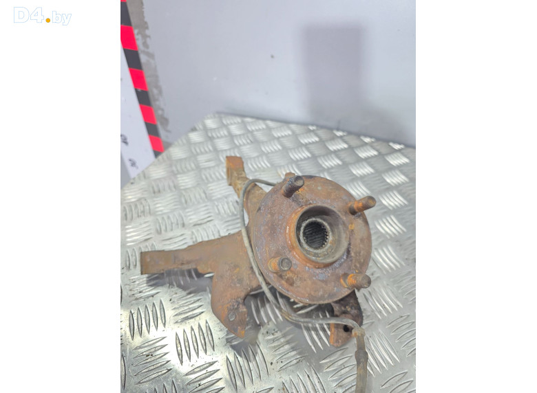 Кулак поворотный левый к Mazda Demio 1999 г.