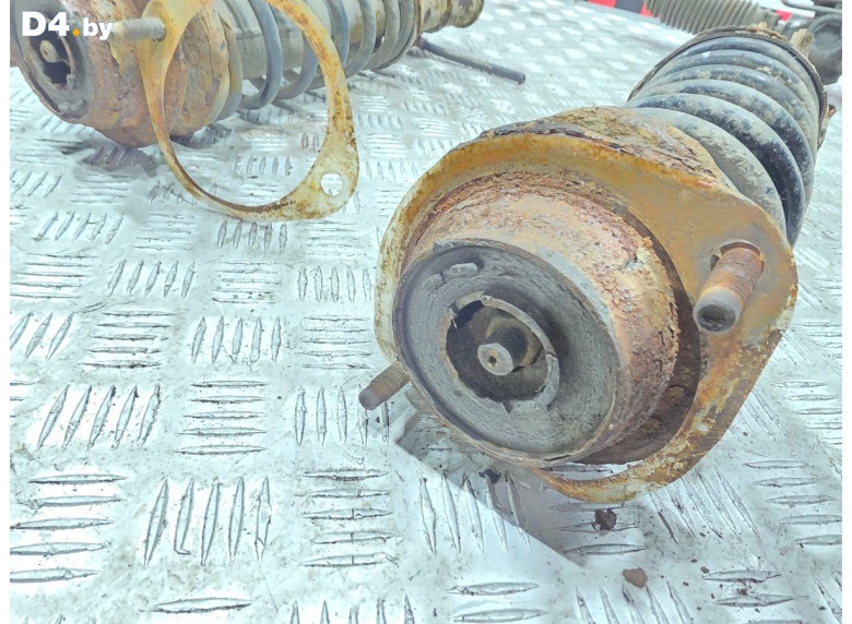 Опора амортизатора верхняя (чашка) к Mazda Demio 1999 г.