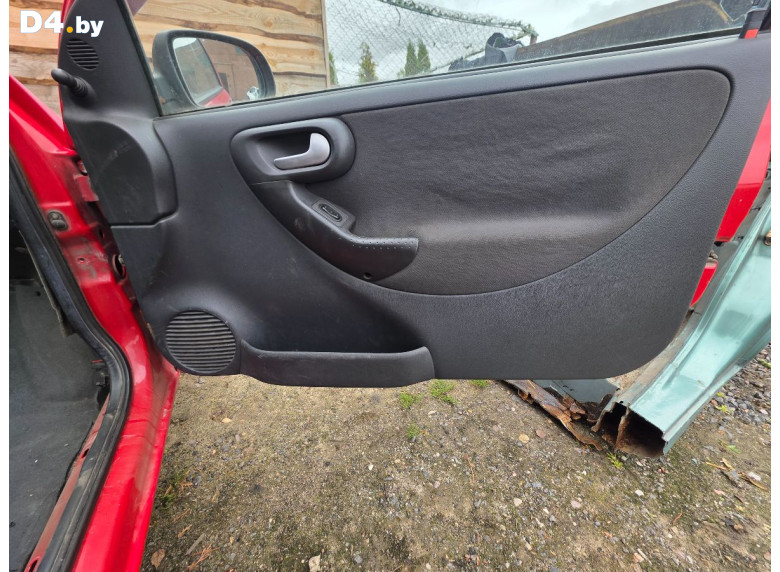 Обшивка двери передней правой (дверная карта) к Opel Corsa 2004 г.
