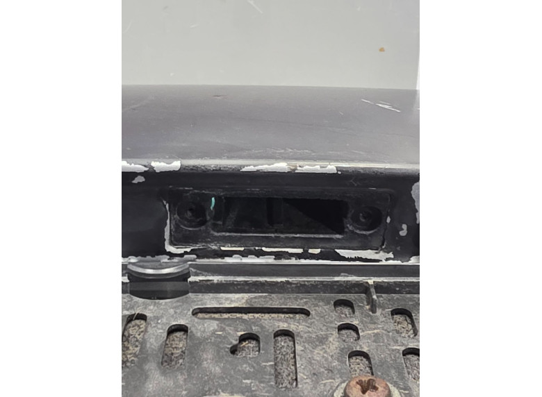Накладка подсветки номера к Volkswagen Passat, 2002г.