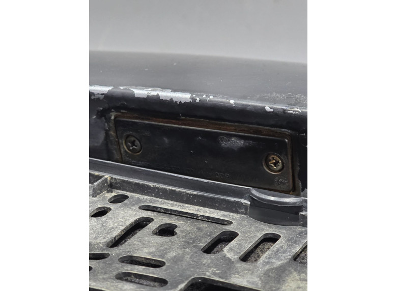 Накладка подсветки номера к Volkswagen Passat, 2002г.