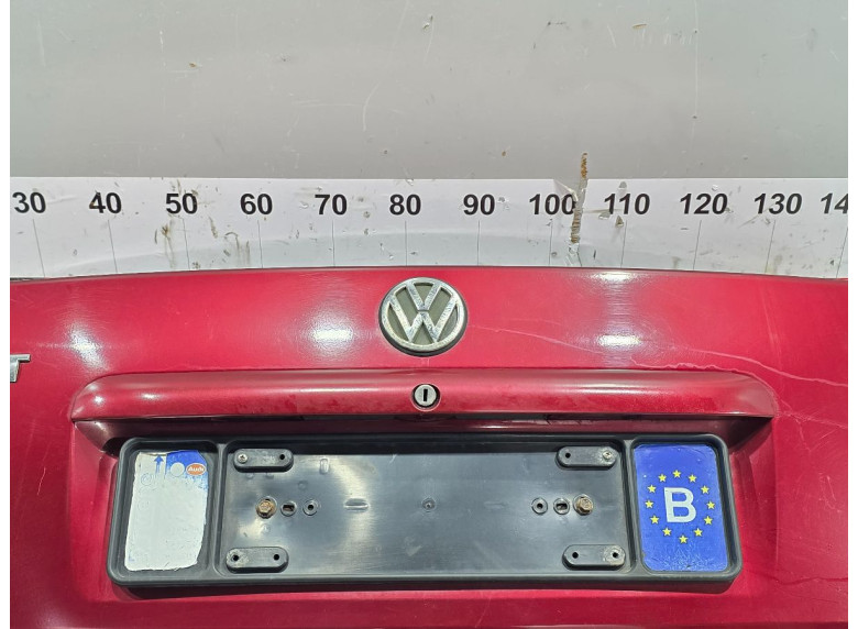 Накладка подсветки номера к Volkswagen Passat, 1998г.