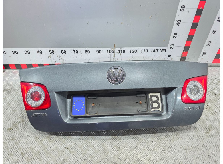 Фонарь крышки багажника левый к Volkswagen Jetta, 2008г.