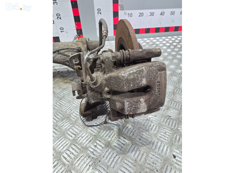 Суппорт задний правый к Renault Scenic 2001 г.