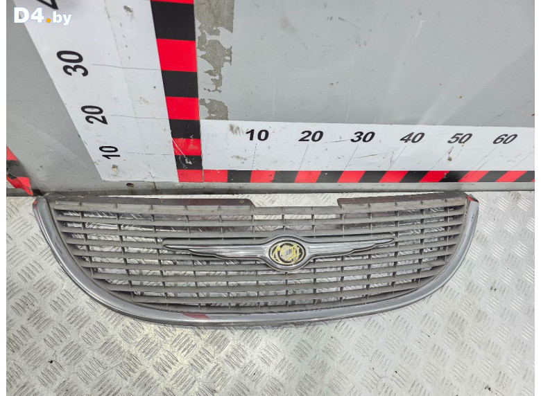 Решетка радиатора к Chrysler Voyager 2002 г.