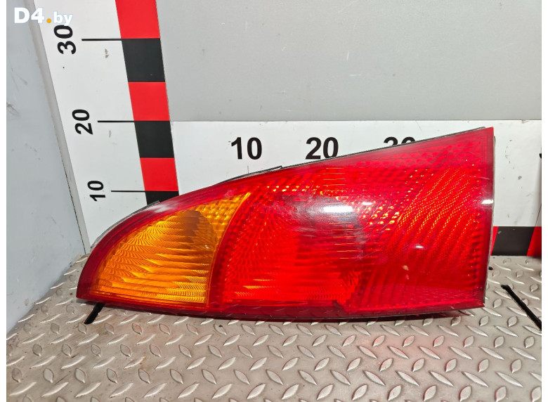 Фонарь задний левый к Ford Focus 2001 г.