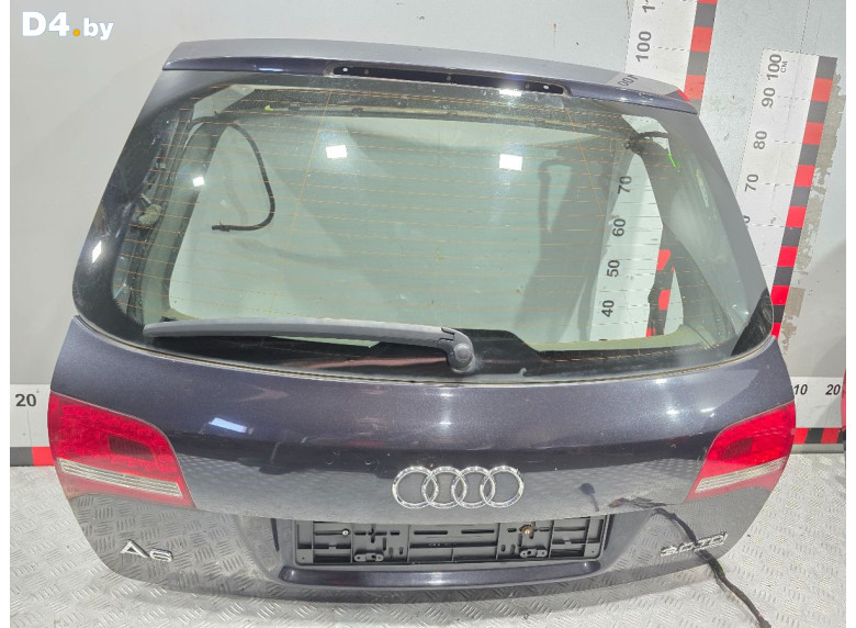 Накладка подсветки номера к Audi A6 2009 г.