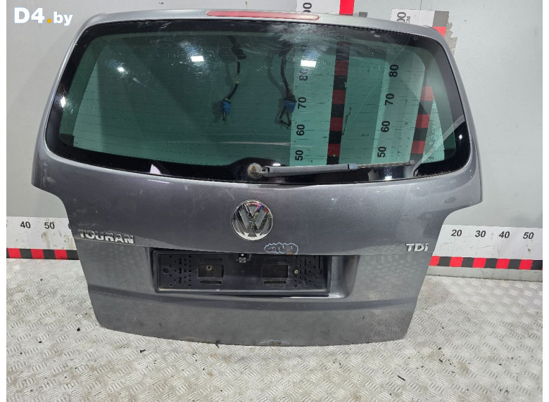 Накладка подсветки номера к Volkswagen Touran 2004 г.