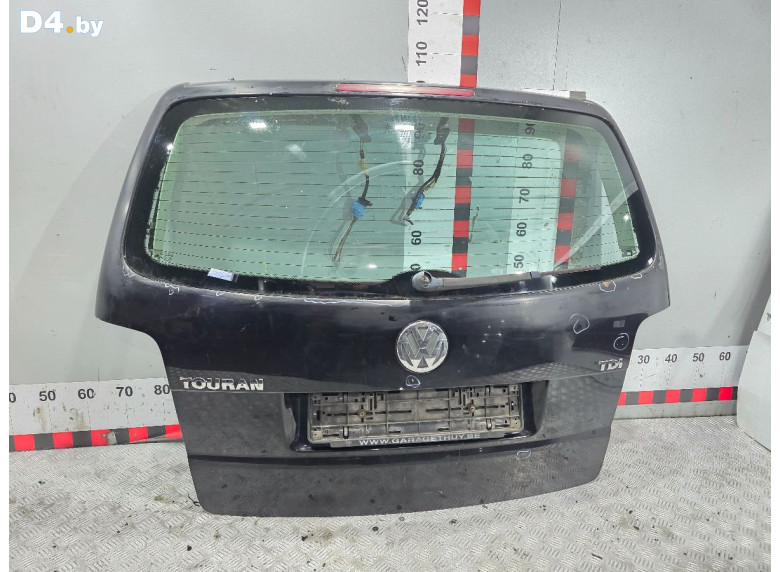 Накладка подсветки номера к Volkswagen Touran 2005 г.