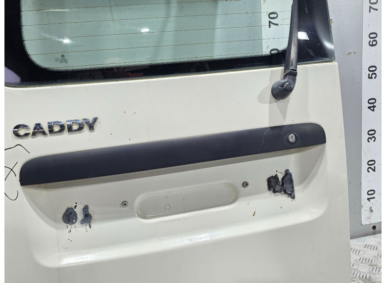 Накладка подсветки номера к Volkswagen Caddy, 2007г.