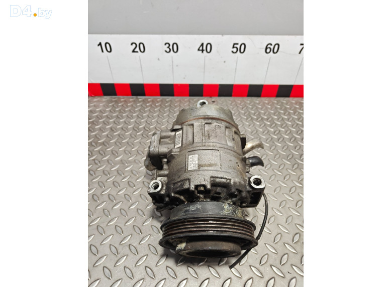 Компрессор кондиционера к Volkswagen Passat 2002 г.