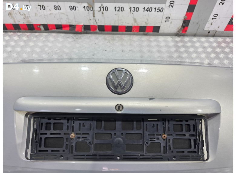 Накладка подсветки номера к Volkswagen Passat 1999 г.