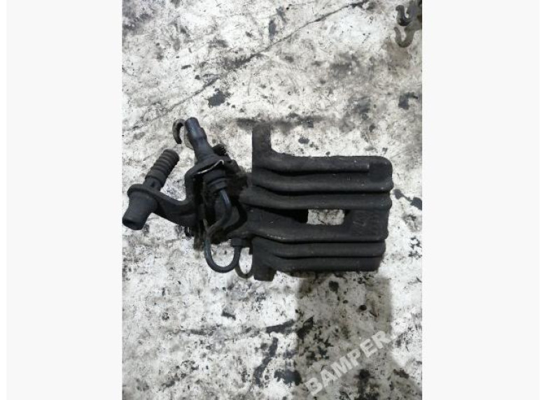 Суппорт задний левый к Volkswagen Golf, 2005г.