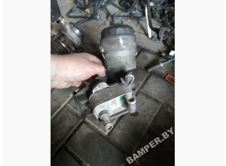 Теплообменник масляного фильтра к Opel Astra, 2004г.