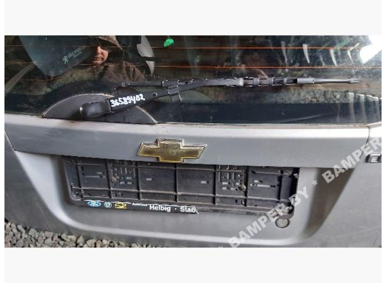 Накладка подсветки номера к Chevrolet Aveo, 2009г.