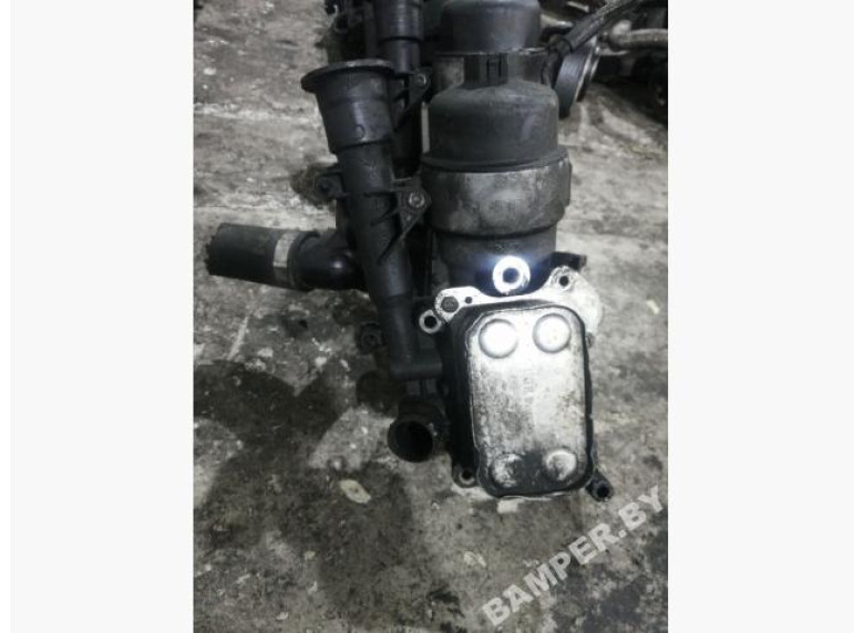 Теплообменник масляного фильтра к Opel Corsa, 2007г.