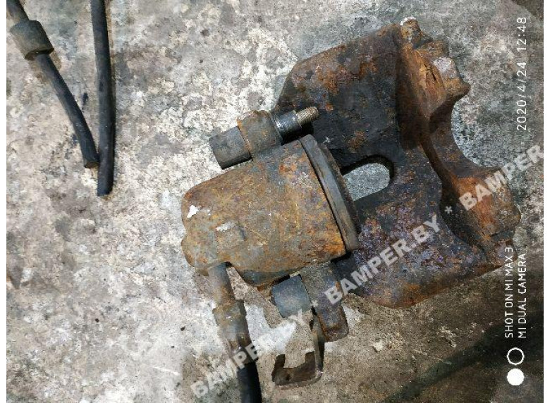 Суппорт передний левый к Volkswagen Sharan, 1998г.