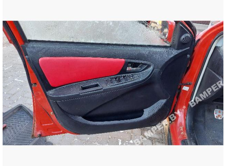 Обшивка двери передней левой (дверная карта) к Geely MK Cross