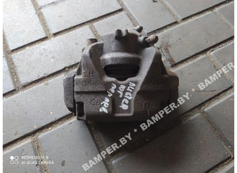 Суппорт передний левый к Renault Duster, 2010г.