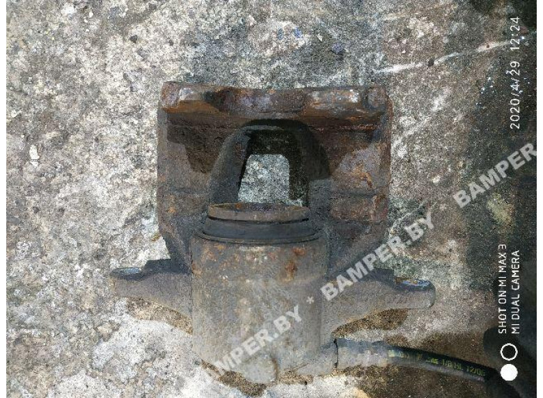 Суппорт передний левый к Fiat Doblo