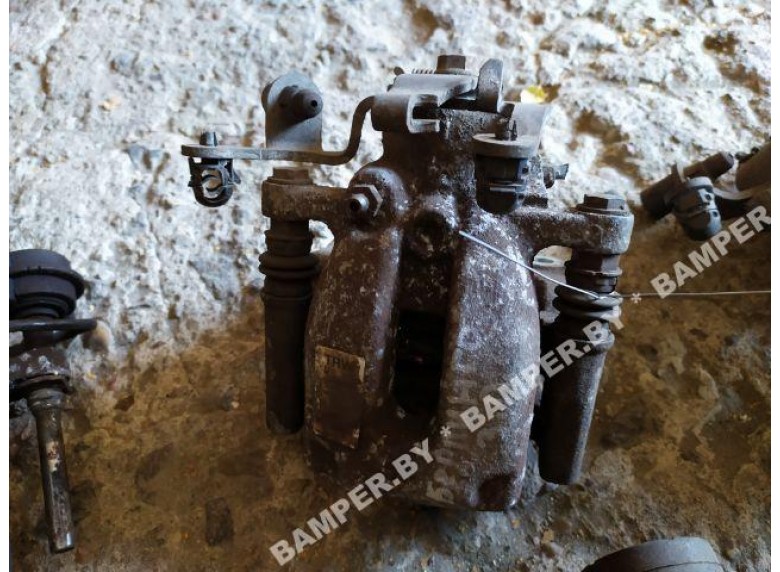 Суппорт задний левый к Citroen Berlingo