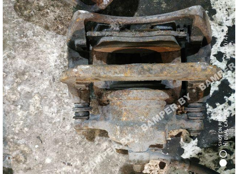 Суппорт передний левый к Opel Corsa, 2004г.