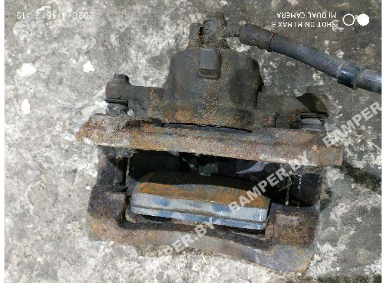 Суппорт передний правый к Nissan Primera