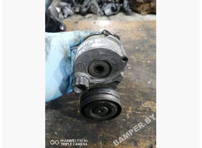 Натяжитель ремня генератора к Opel Astra, 2006г.