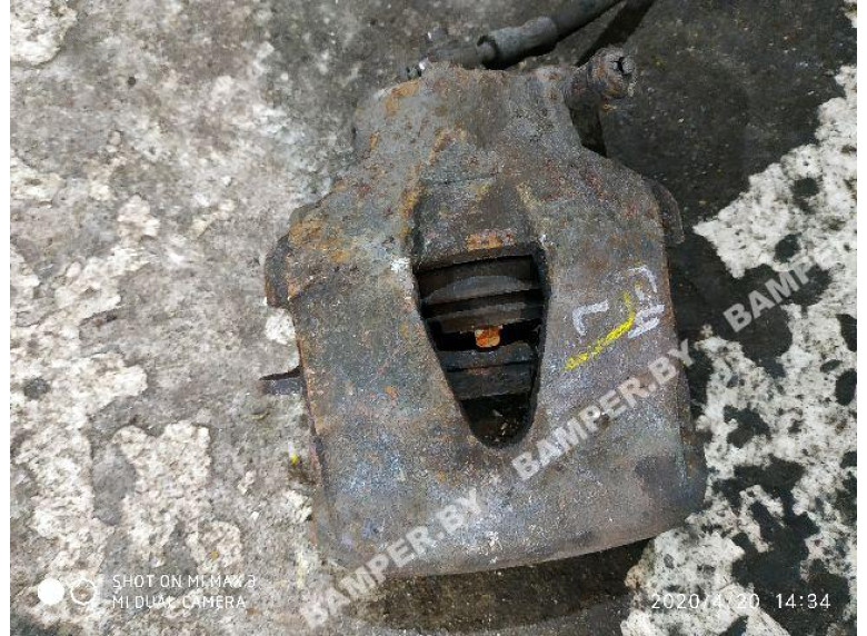 Суппорт передний левый к Skoda Octavia