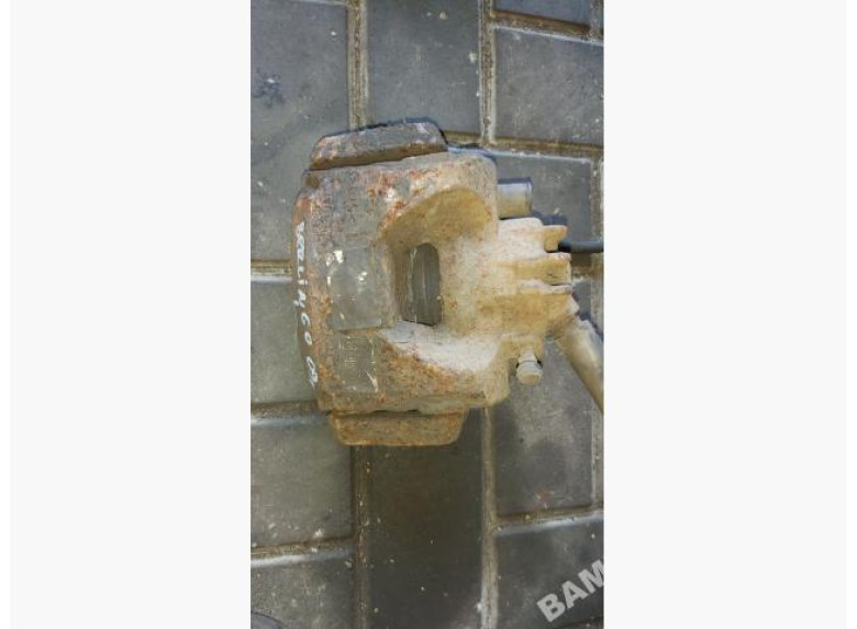 Суппорт передний левый к Citroen Berlingo, 2009г.