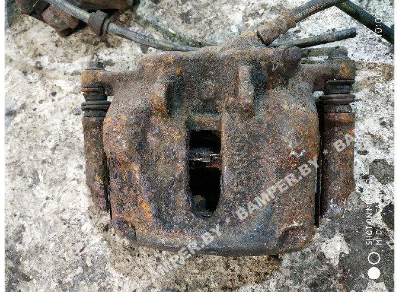 Суппорт передний левый к Renault Trafic, 2002г.