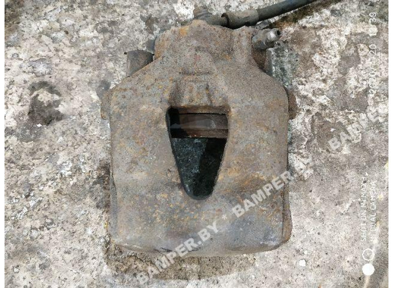 Суппорт передний левый к Volkswagen Golf, 1999г.