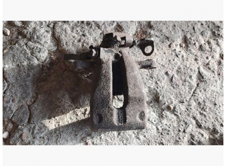 Суппорт задний левый к Opel Astra