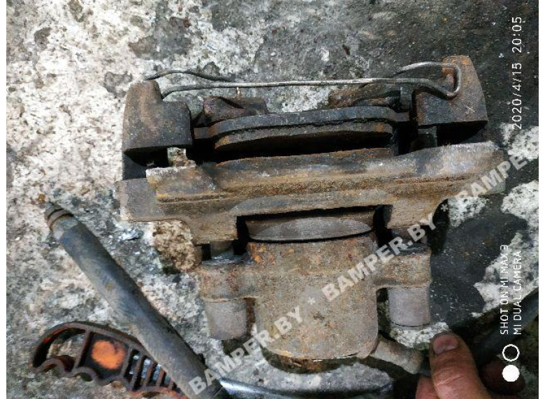 Суппорт передний левый к Fiat Punto